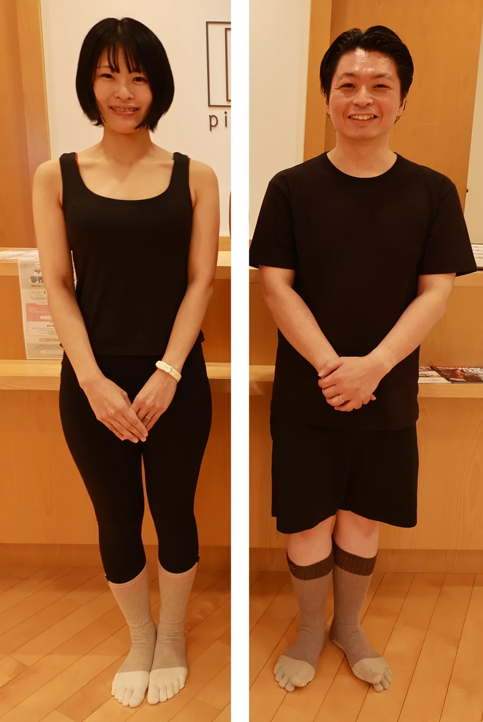 借りたウェアを着た2人。左はツマサマで黒のブラトップとレギンス、右はタカで黒のTシャツとハーフパンツ。2人とも丈の長い5本指の靴下